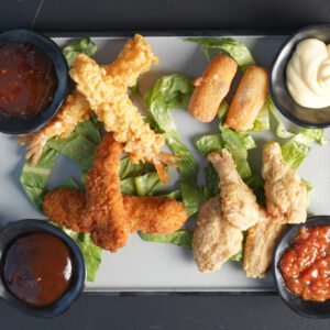 Combo appetizers dipped in cheese